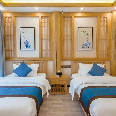 Peer & Forever Guest House Лицзян Экстерьер фото
