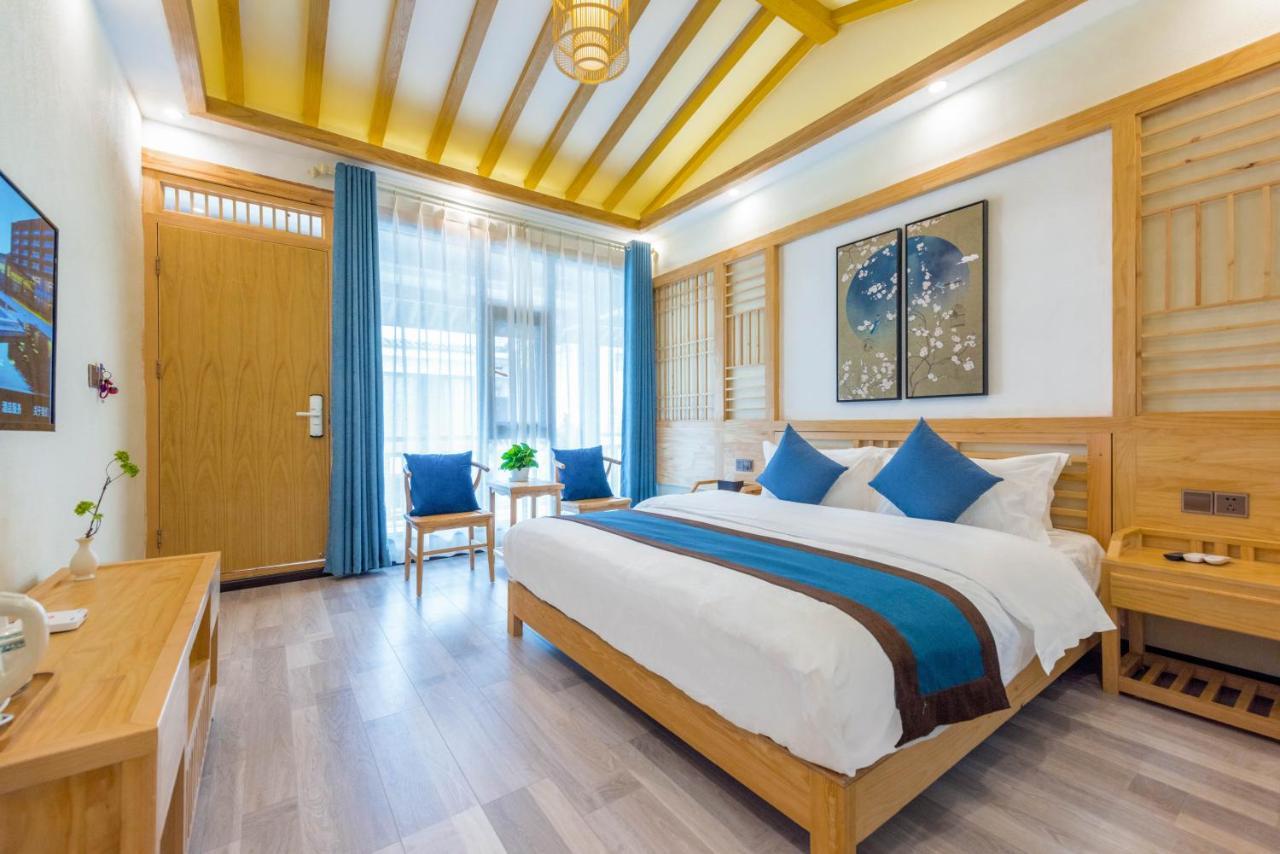 Peer & Forever Guest House Лицзян Экстерьер фото