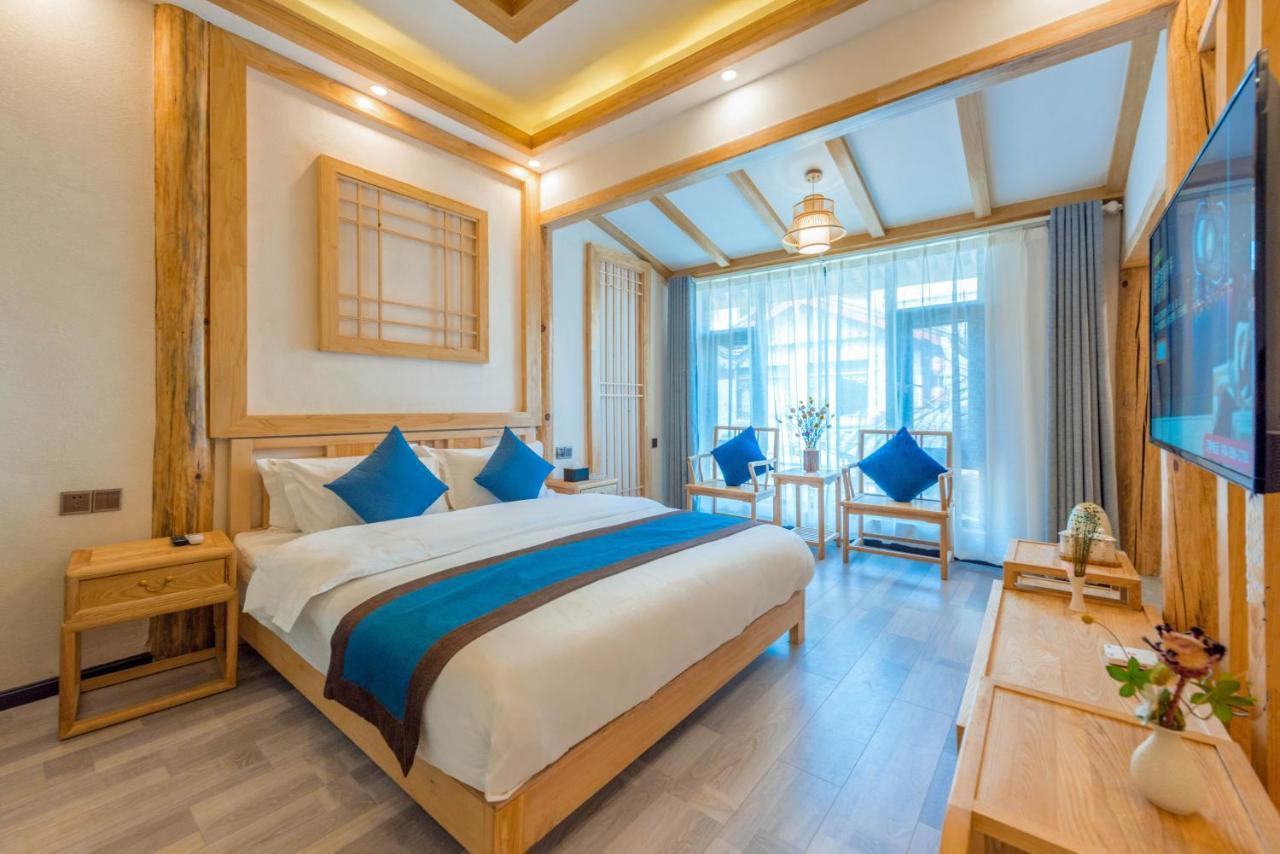 Peer & Forever Guest House Лицзян Экстерьер фото