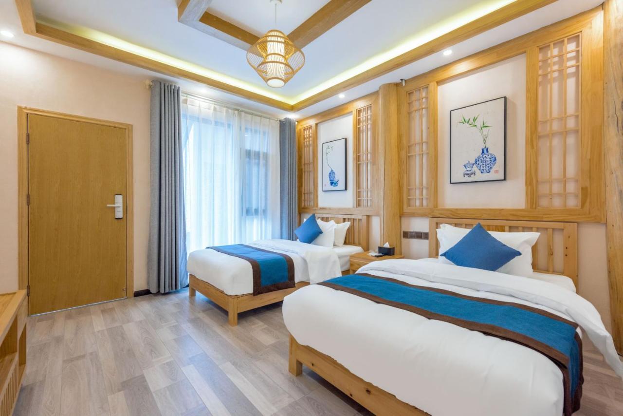 Peer & Forever Guest House Лицзян Экстерьер фото
