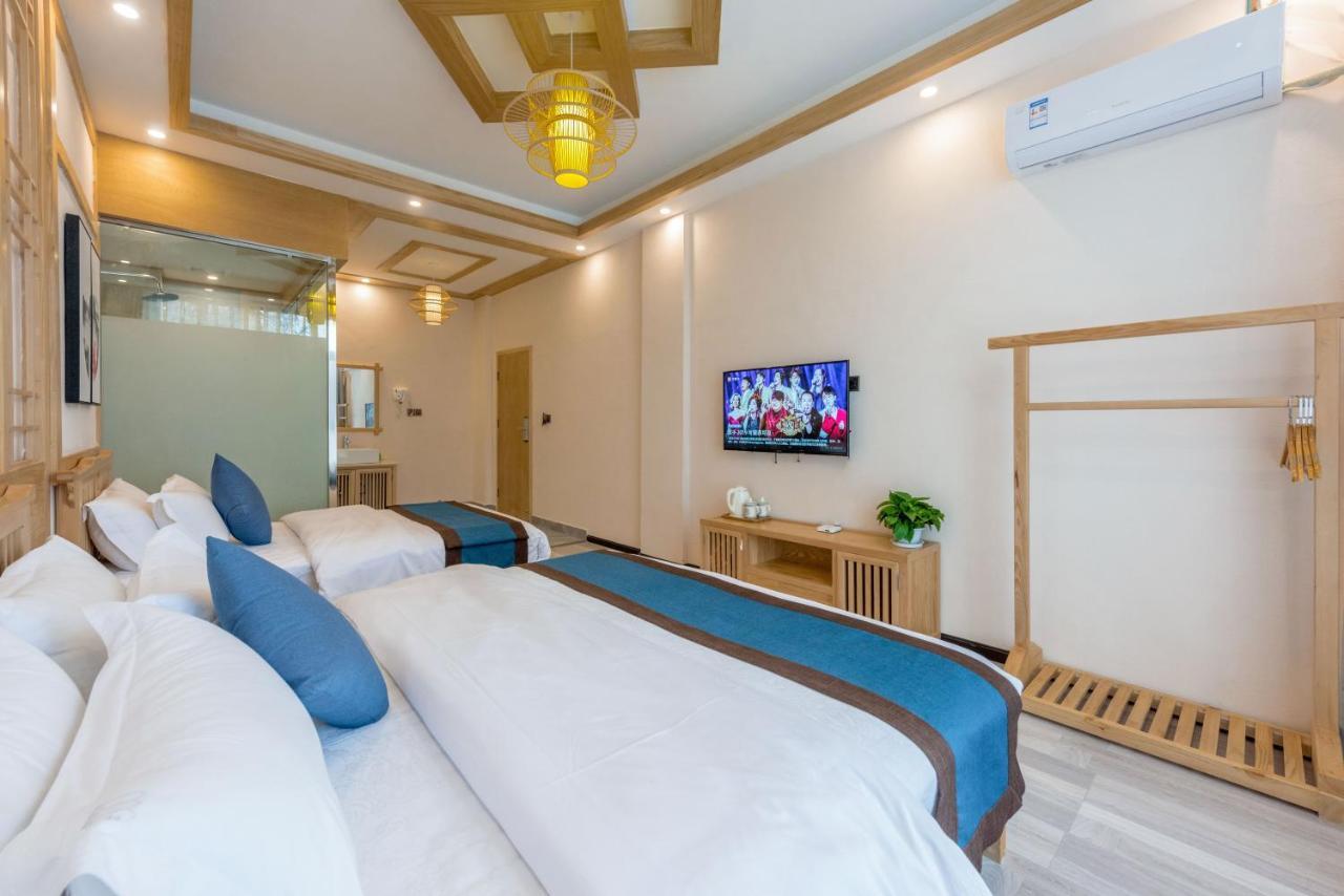 Peer & Forever Guest House Лицзян Экстерьер фото