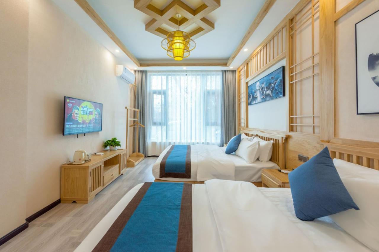 Peer & Forever Guest House Лицзян Экстерьер фото