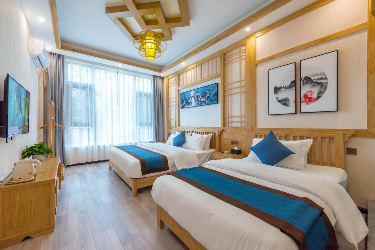Peer & Forever Guest House Лицзян Экстерьер фото